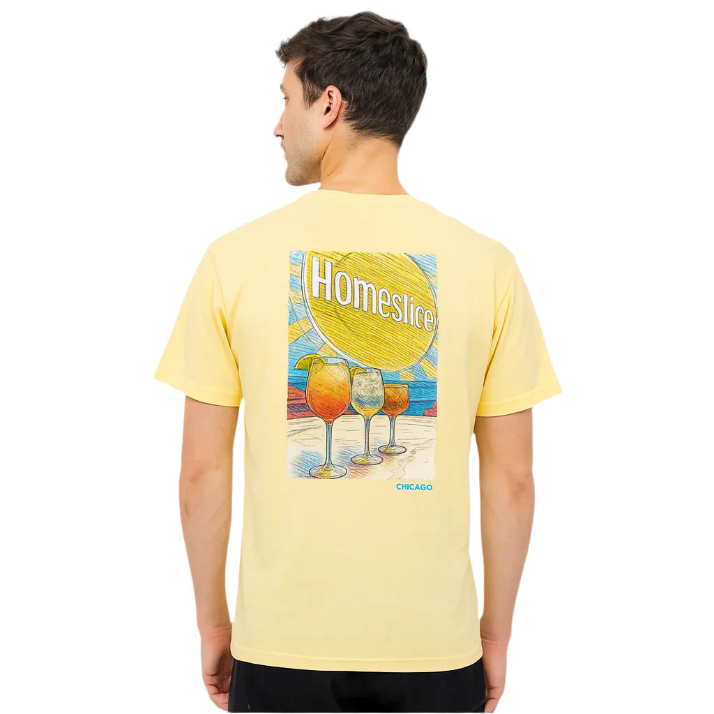 Man wearing a yellow t-shirt with 'Homeslice' graphic on the back