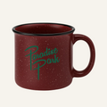 Red speckled mug with 'Paradise Park' text on a white background
