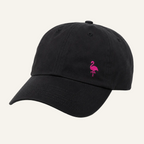 A black cotton baseball cap featuring a small embroidered pink flamingo on the front, set against a plain white background.