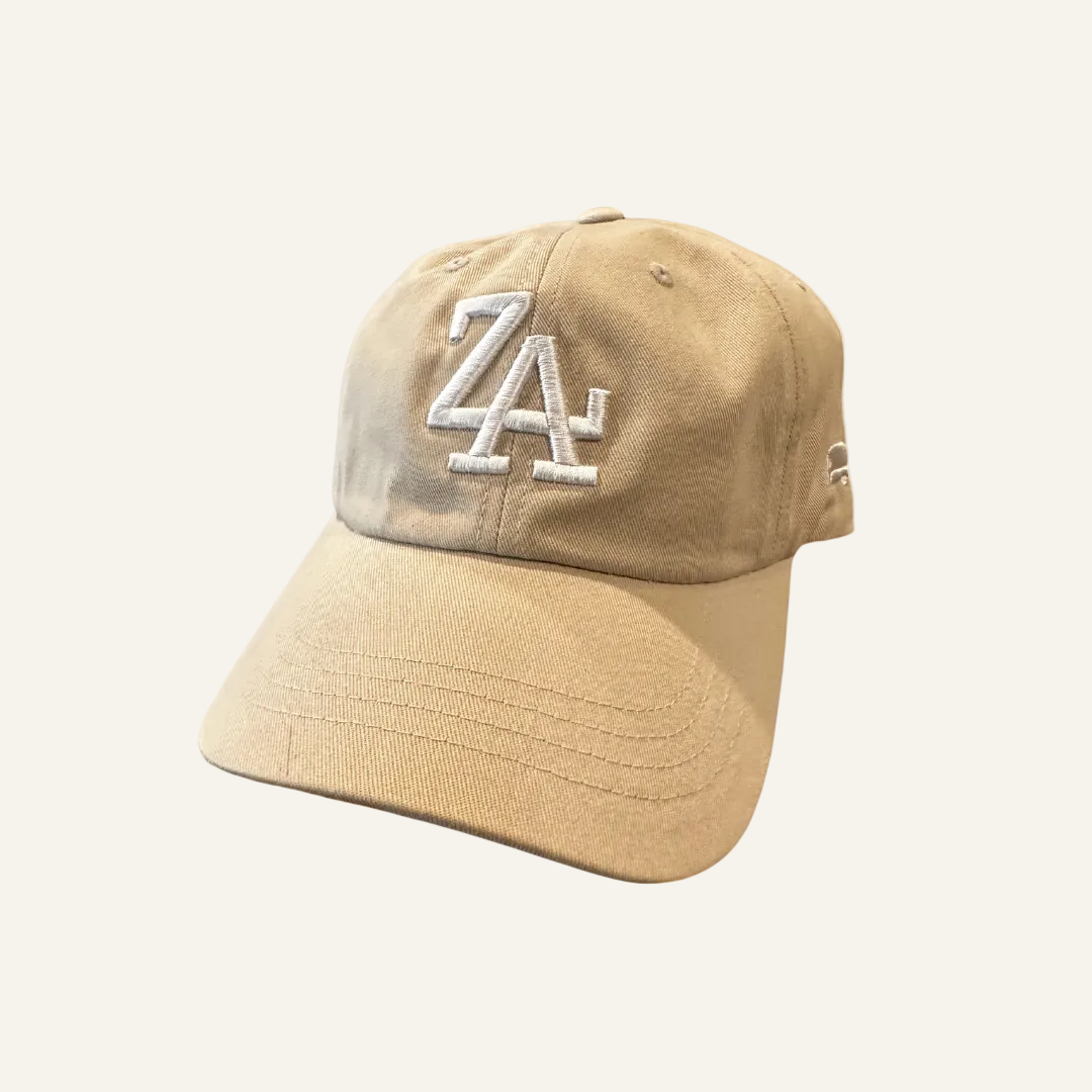 Beige cap with 'ZA' logo on a white background