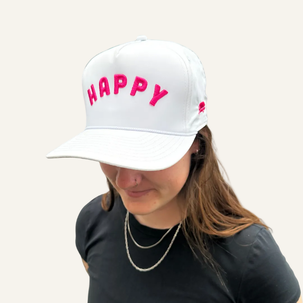 pink and white happy hat